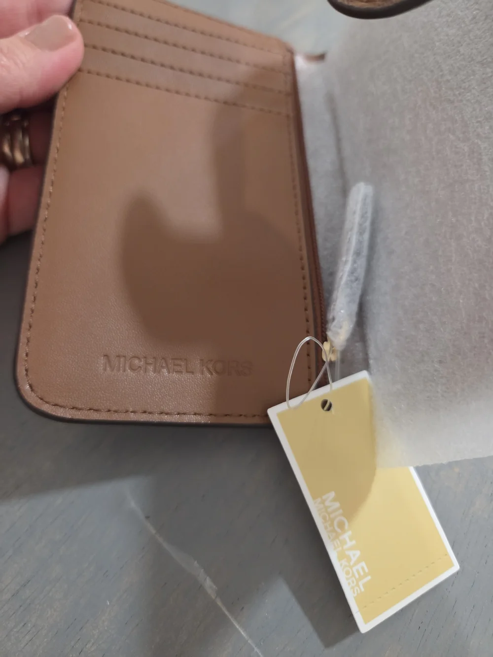 Michael Kors Brown Pebbled Leather Wallet-Style Phone Case with Gold MK Logo